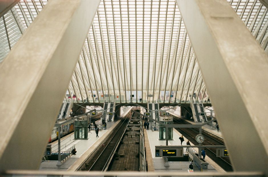 Busy interior of Brussels-Midi train station in Belgium with travelers