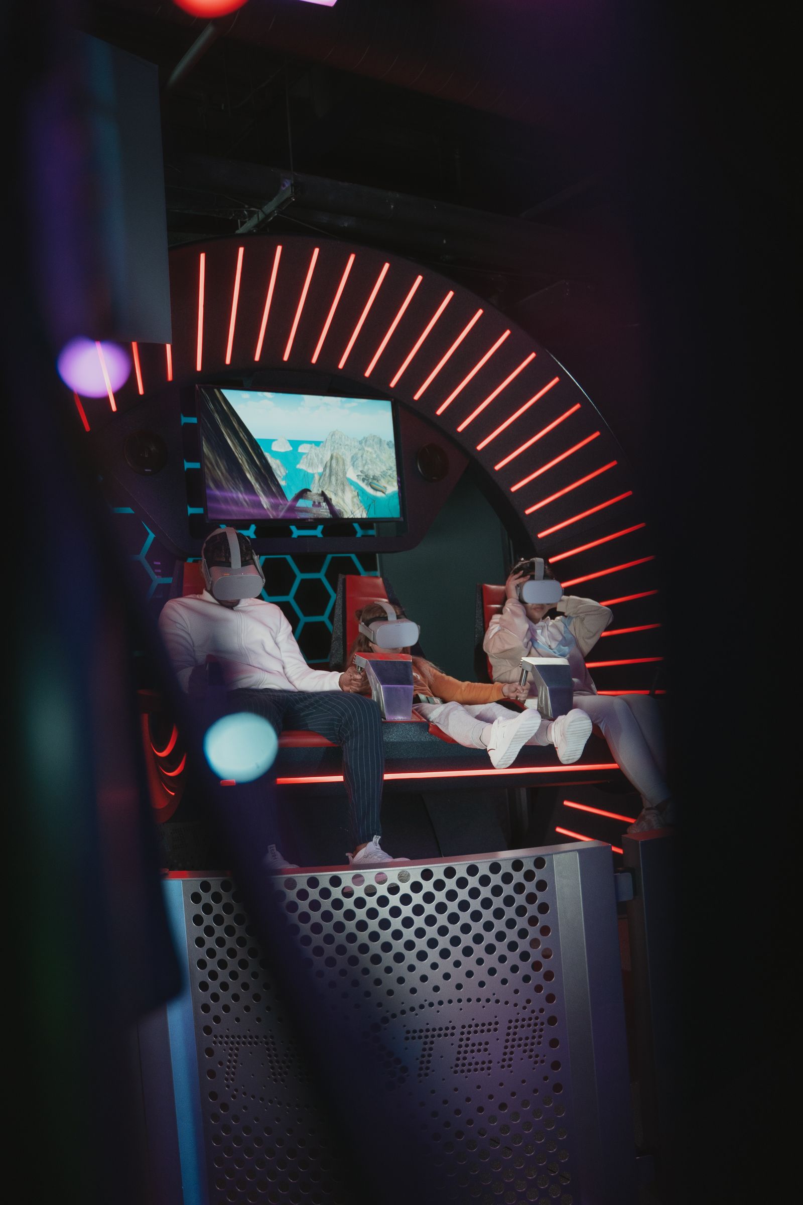 Friends sharing a social virtual-reality experience in a community setting