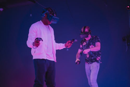 Men Wearing VR Headsets Looking Down