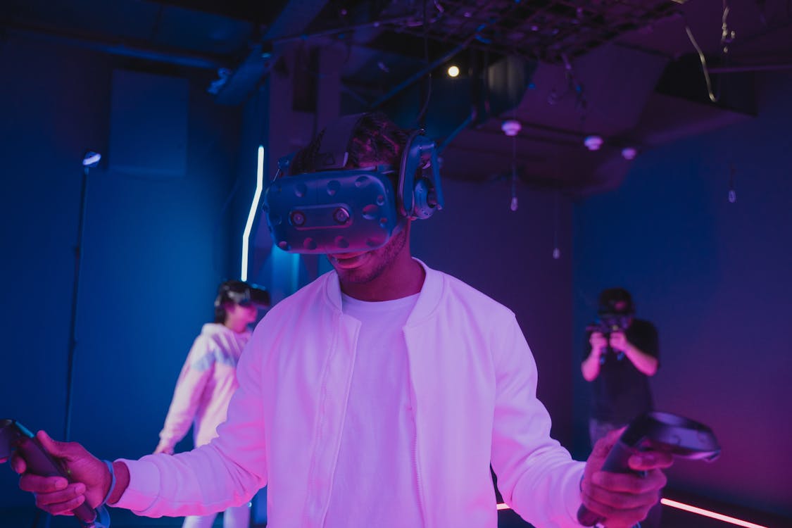 A Man Playing Video Games with a VR Headset