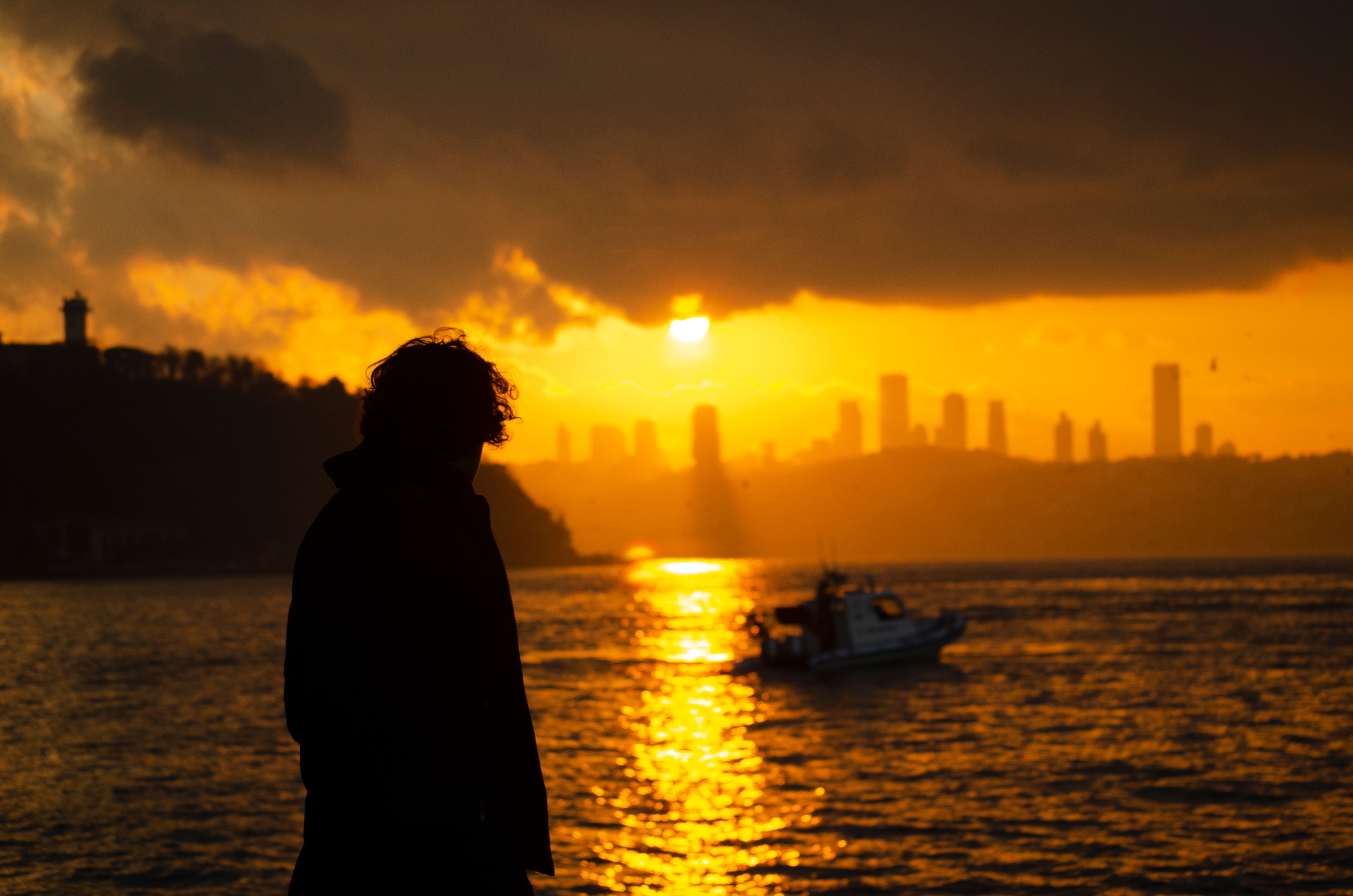 Silhouette of a Man During Sunset · Free Stock Photo