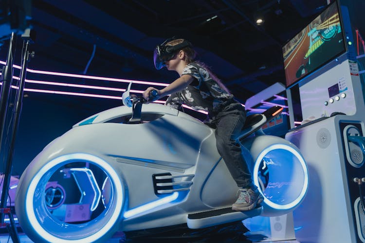 A Person Riding On A Motorcycle While Wearing VR Glasses