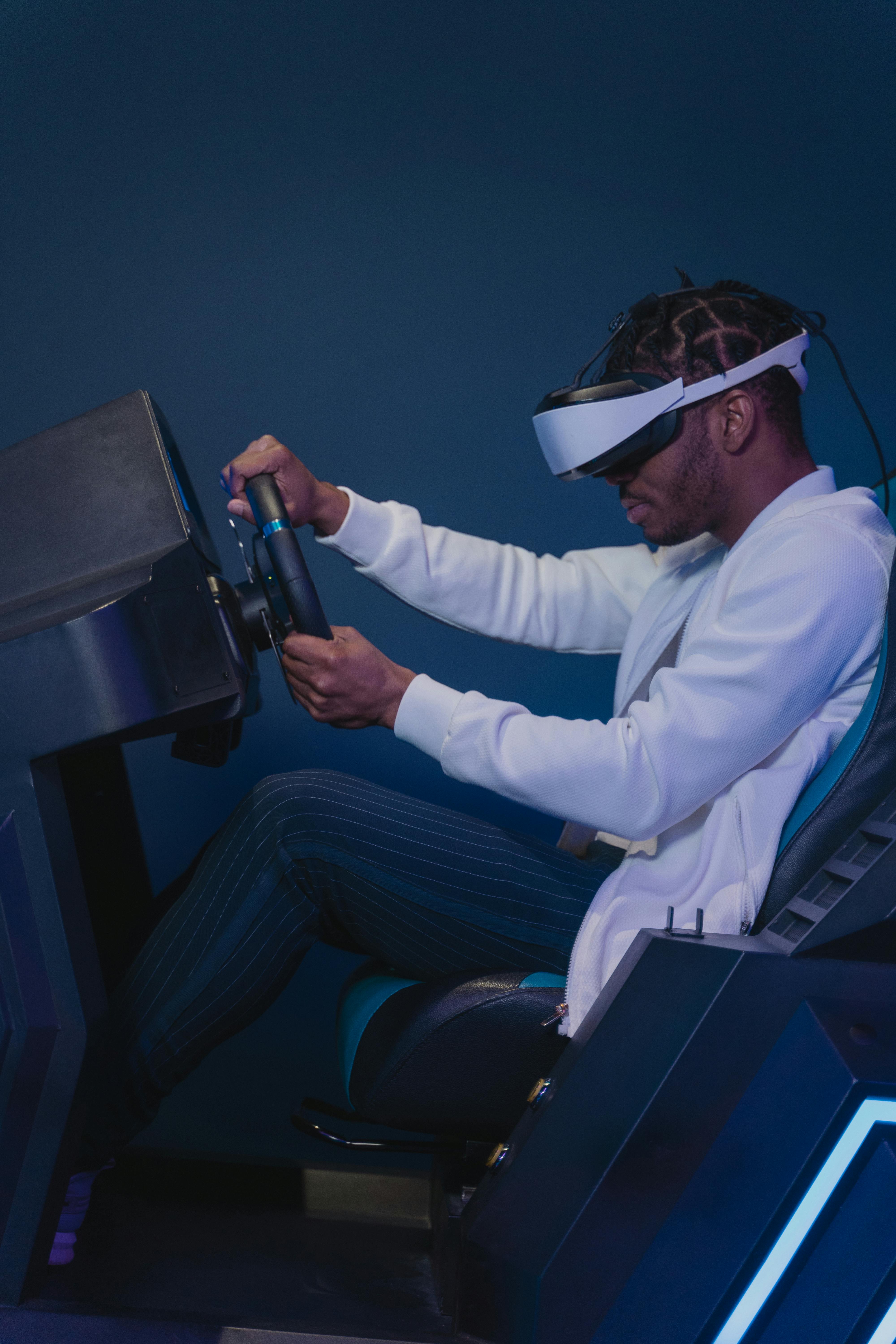 man on a virtual reality driving simulator