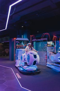 A woman navigating a futuristic motorbike simulator in a neon-lit gaming arcade with VR headset.