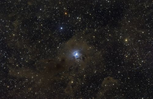 Free A breathtaking view of a nebula surrounded by countless stars, showcasing the grandeur of the cosmos. Stock Photo