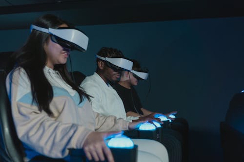 A Group of People Playing Virtual Reality Glasses