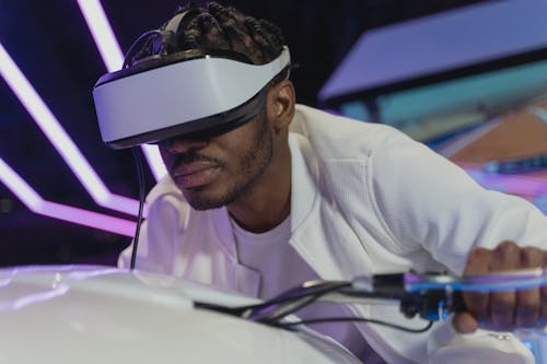 Close-Up Shot of a Man Playing Virtual Reality Glasses