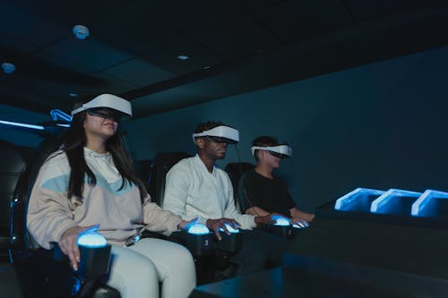 A Group of People Playing Virtual Reality Glasses