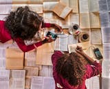 Overhead Shot of Two Women Reading Books