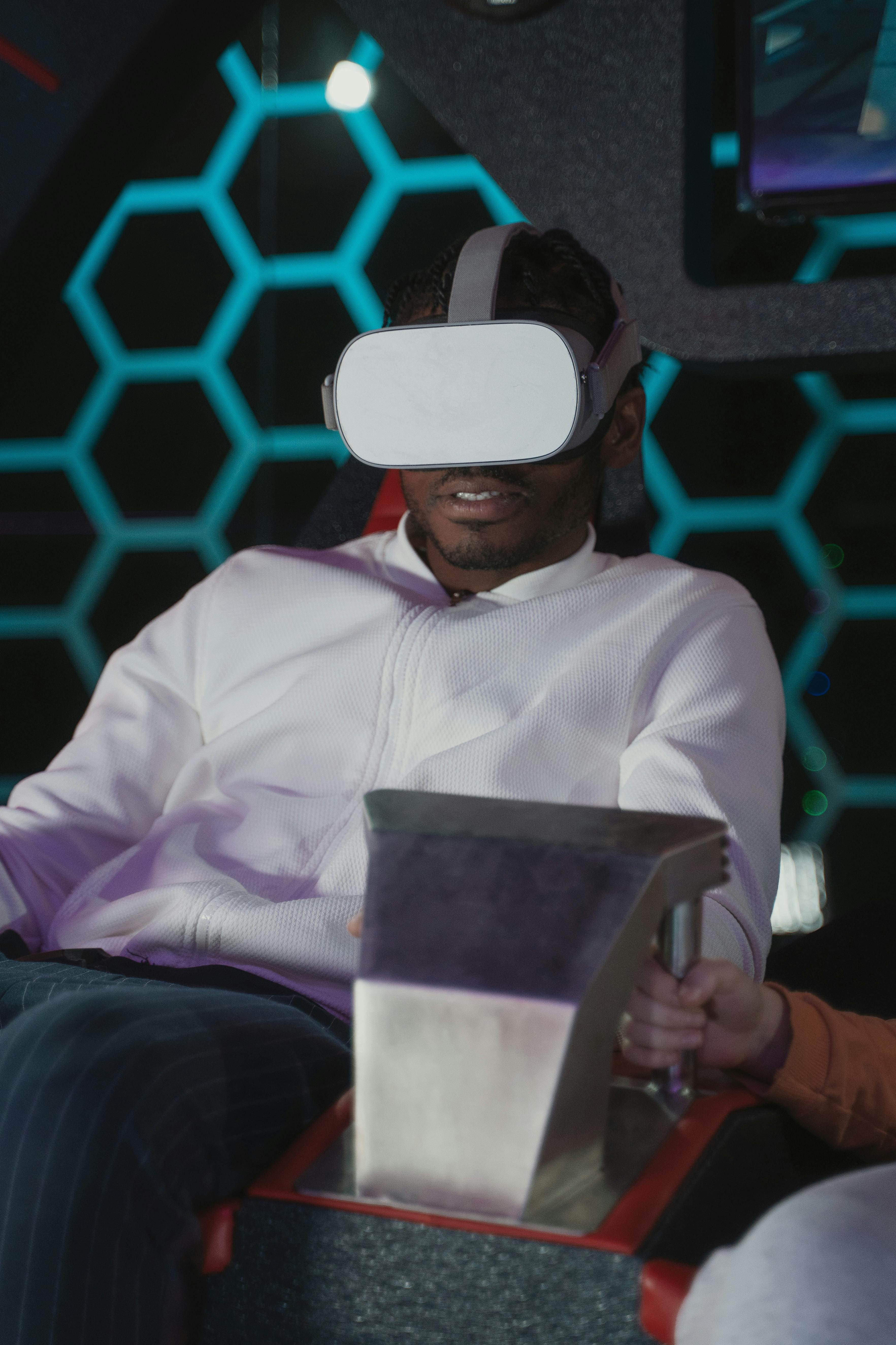 a man playing virtual reality glasses