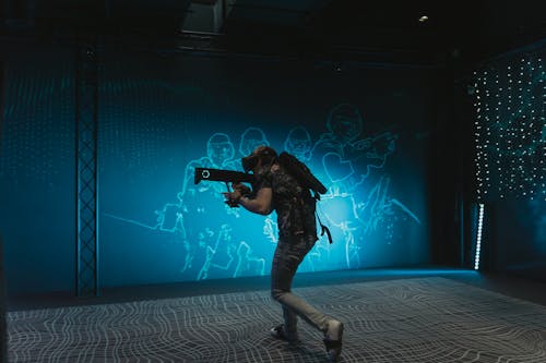 Man Playing with Virtual Reality Gun