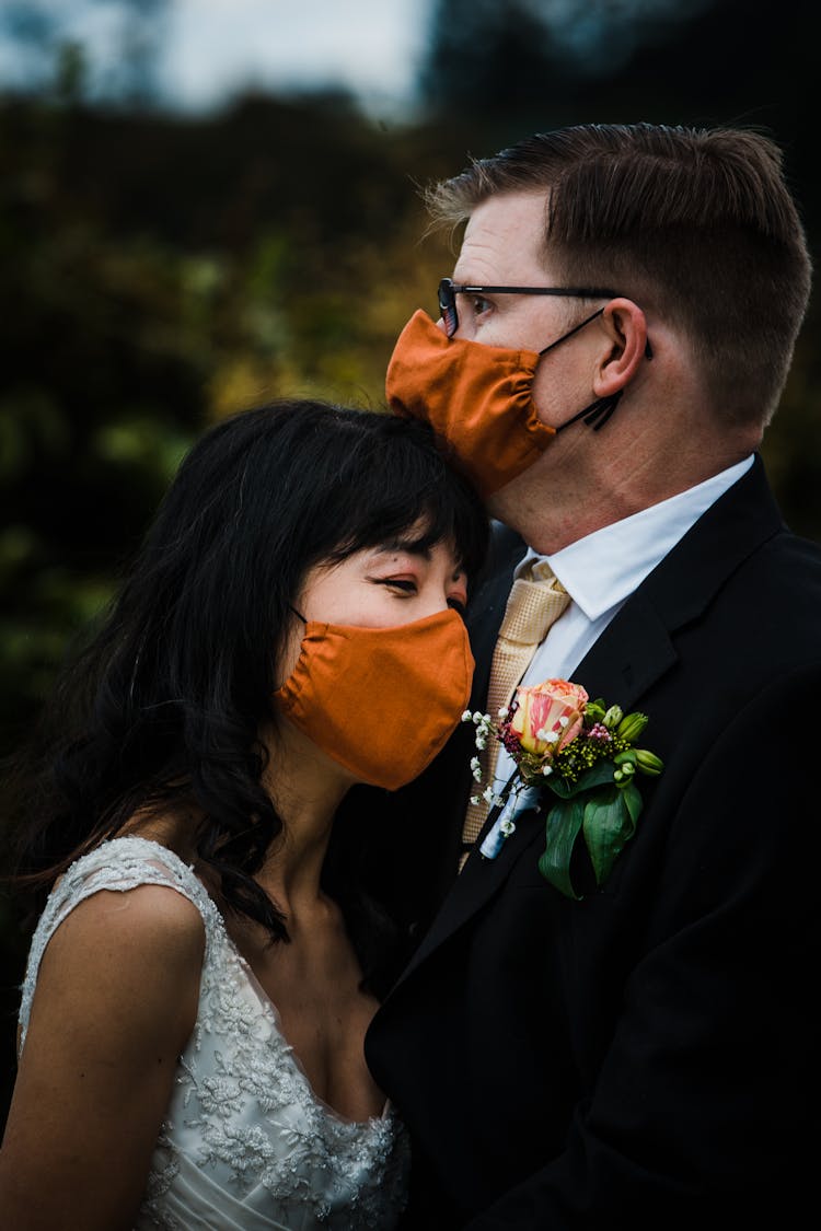 Romantic Diverse Newlyweds Hugging In Park