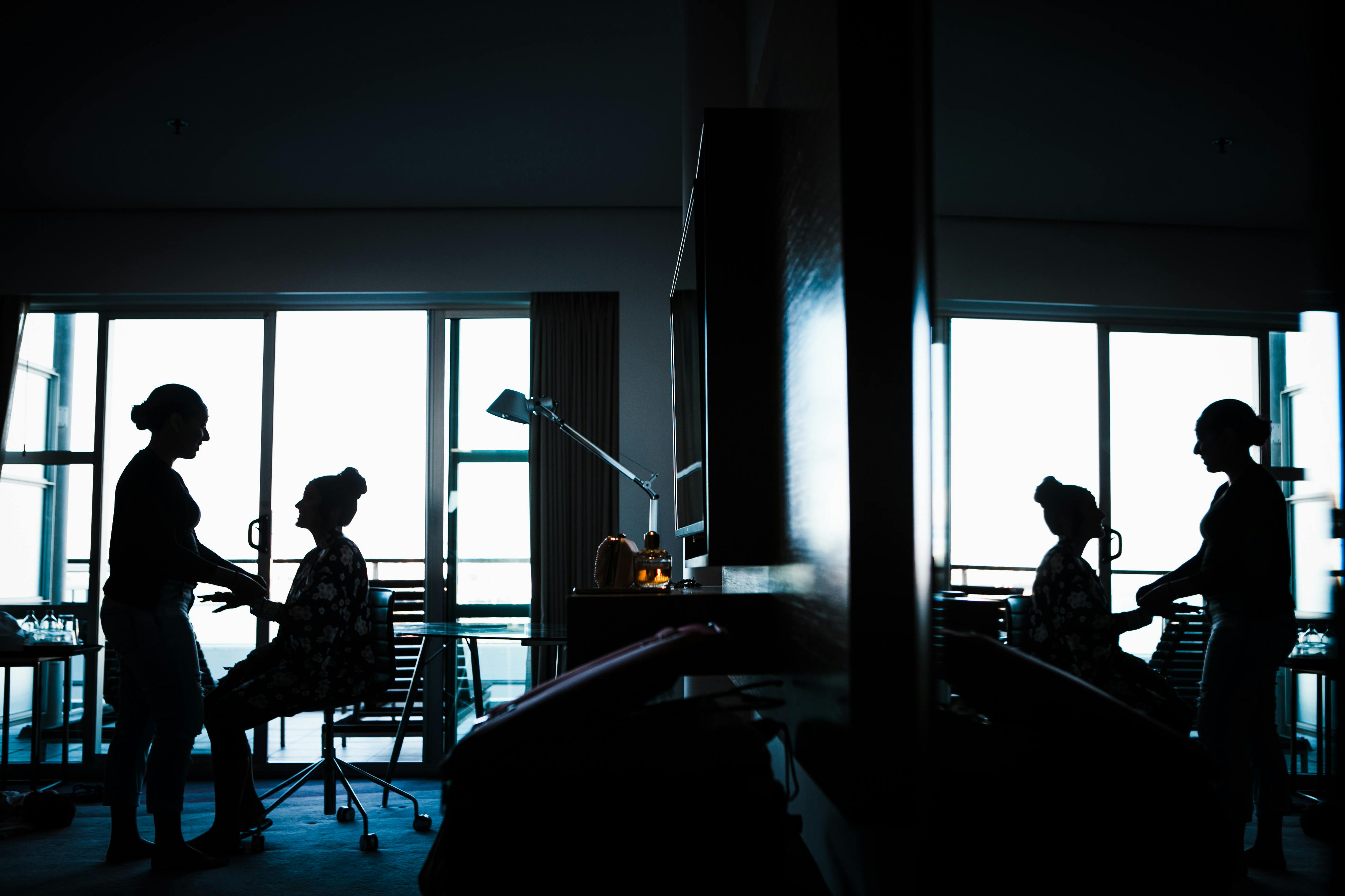 unrecognizable women spending time together in modern apartment