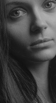 Elegant grayscale portrait capturing the beauty and emotion of a woman in Kyiv.