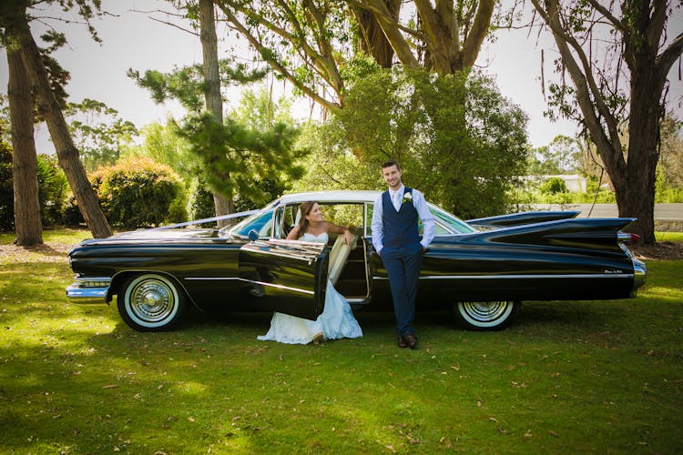 Wedding Couple And Retro Car In Nature