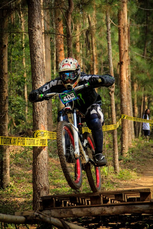 A Male Cyclist Riding a Bike