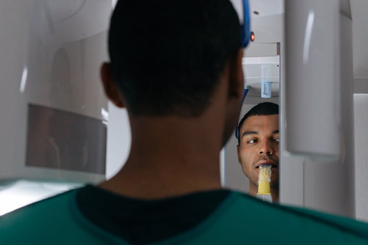 A Man Having A Dental Checkup