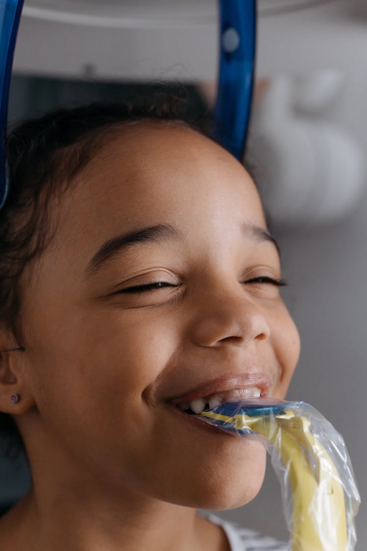 Close-Up Shot Of A Girl Having A Dental Checkup