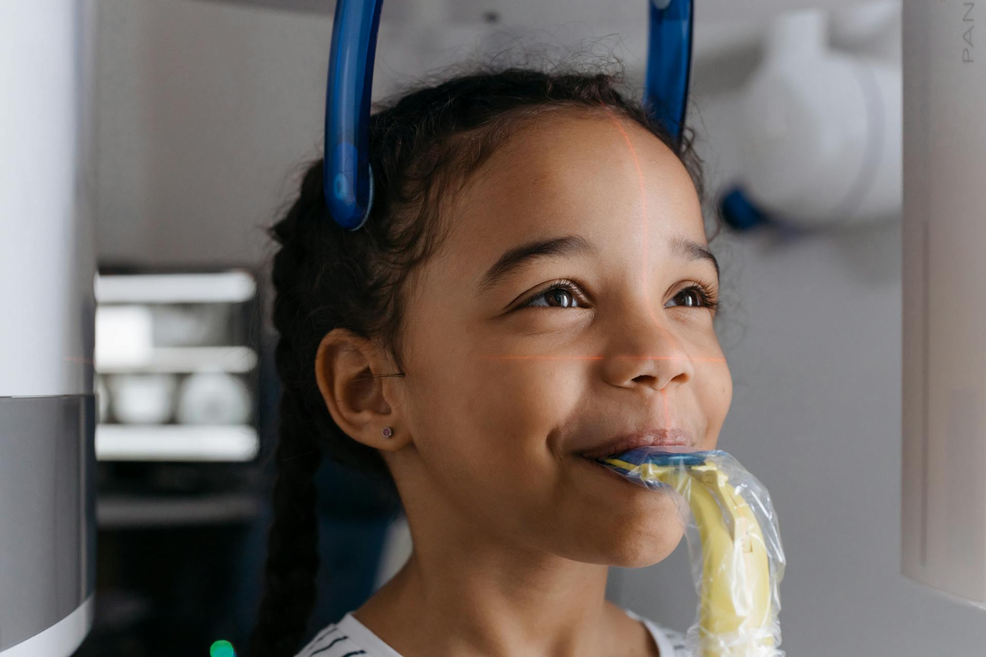 Close-Up Shot of a Girl Having a Dental Checkup