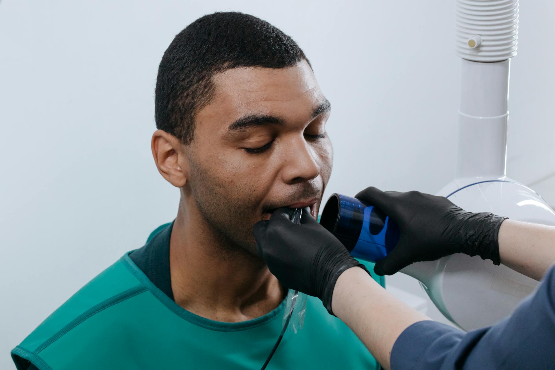 Close-Up Shot of a Man Having a Dental Checkup