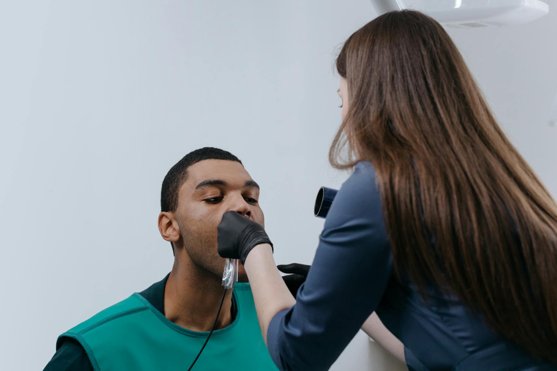 A Man Having a Dental Checkup