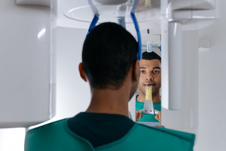 A Man Having A Dental Checkup