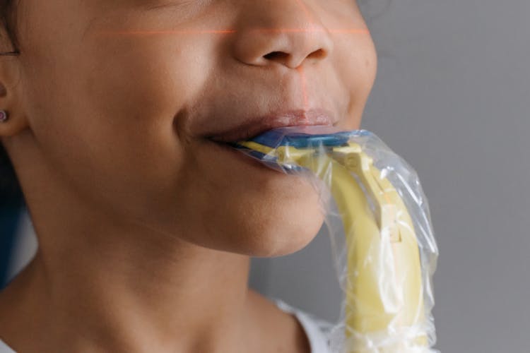 Close-Up Shot Of A Child Having A Dental Checkup