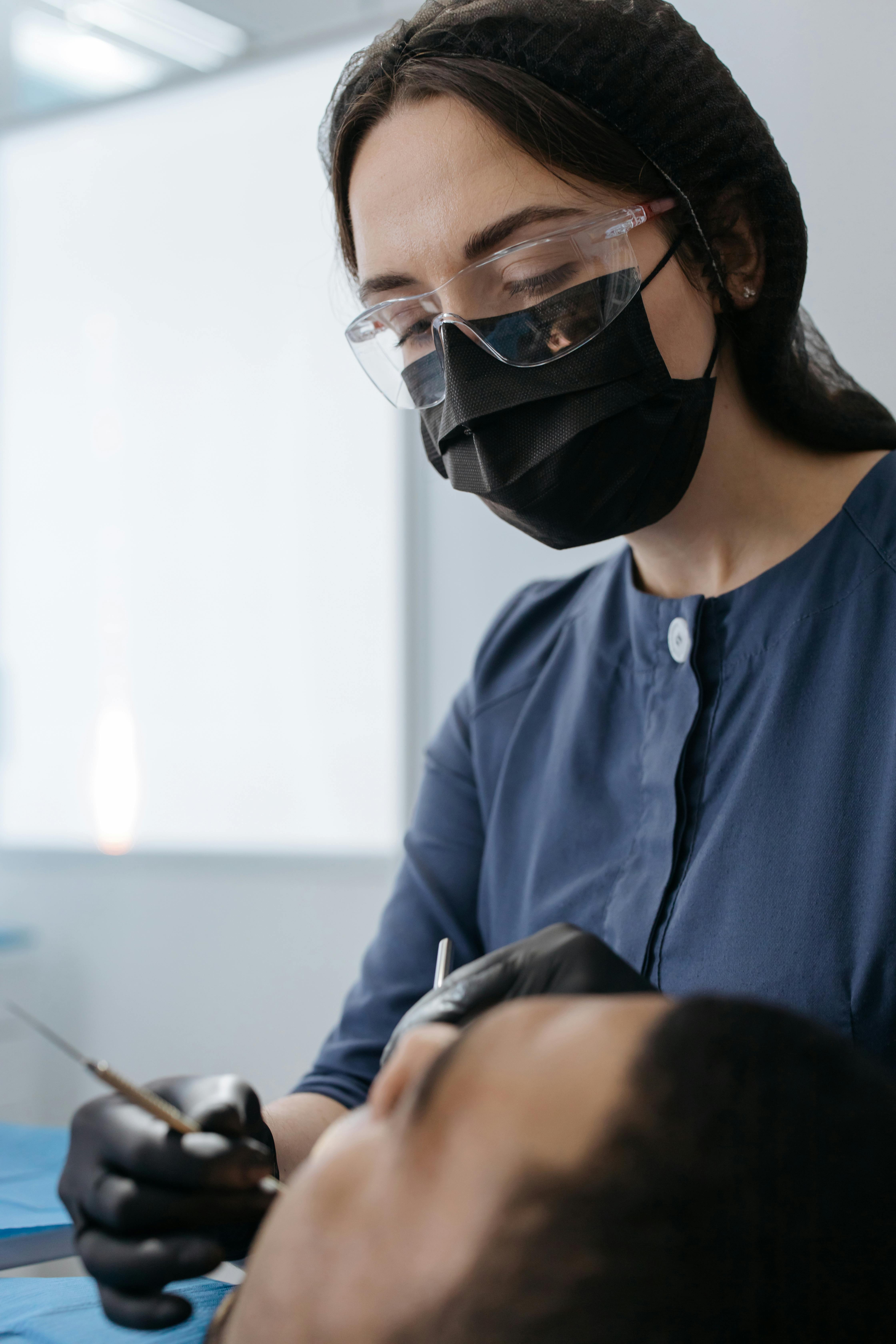 a dentist doing a dental checkup