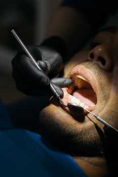 Dental checkup with a mouth mirror
