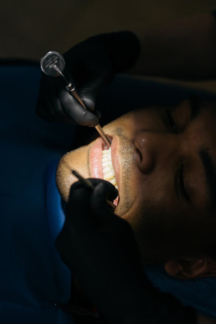 Close-Up Shot Of A Man Having Dental Checkup