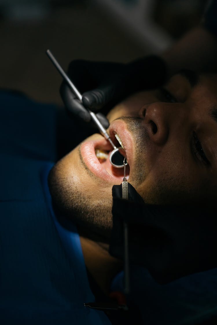 Close-Up Shot Of A Man Having Dental Checkup