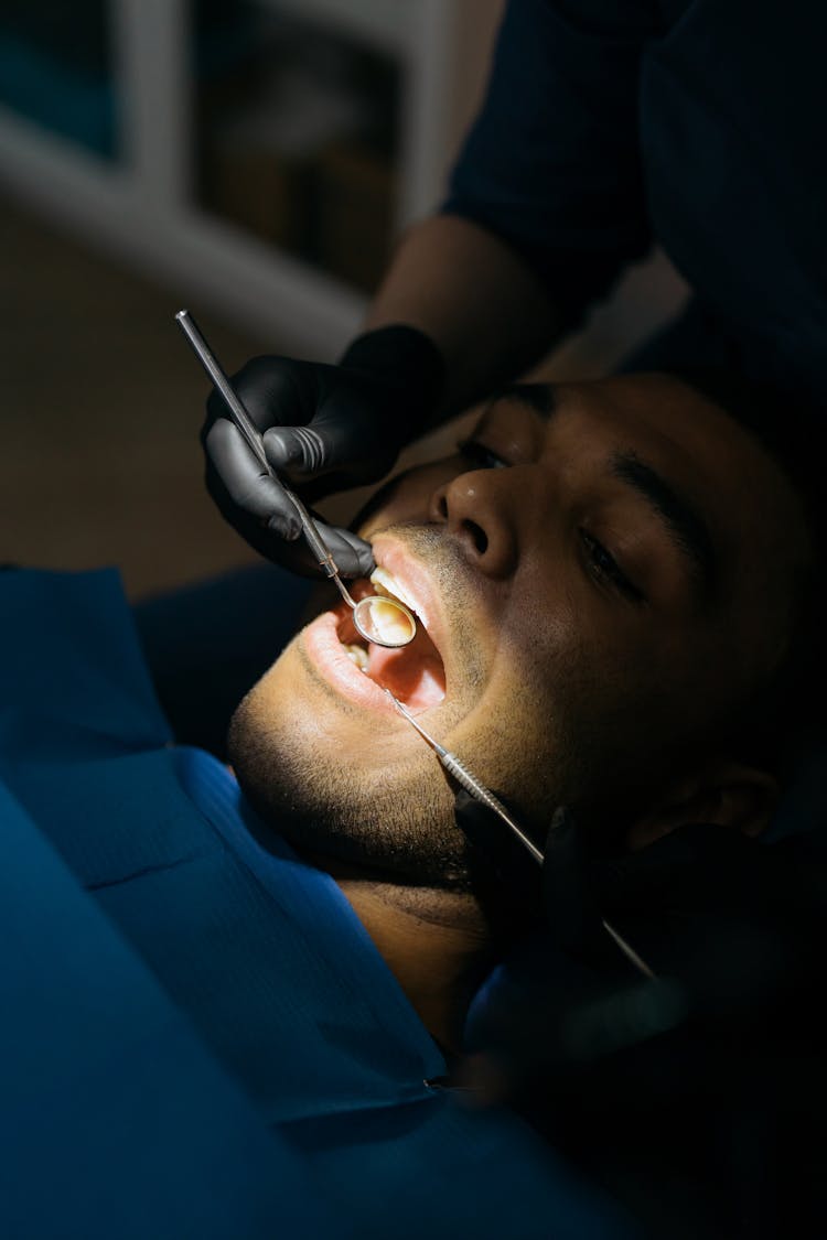 Close-Up Shot Of A Man Having Dental Checkup