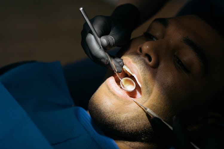 Close-Up Shot Of A Man Having Dental Checkup