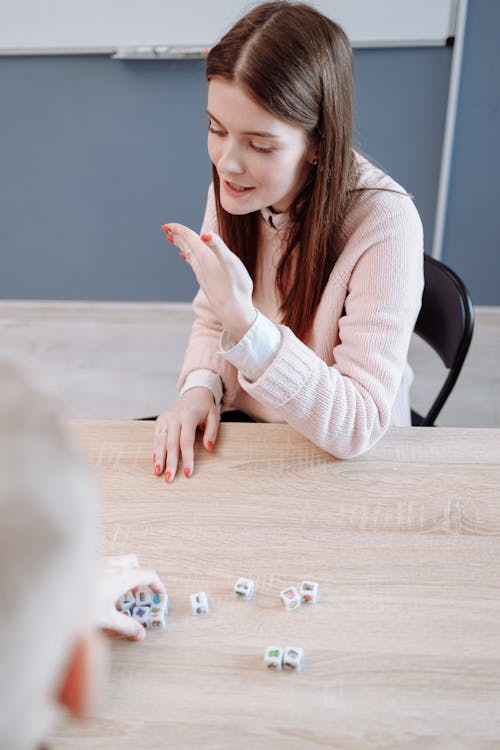 Free Woman Playing Guessing Game Stock Photo