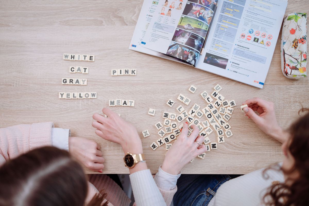 Spanish vocabulary flashcards spread on a study desk