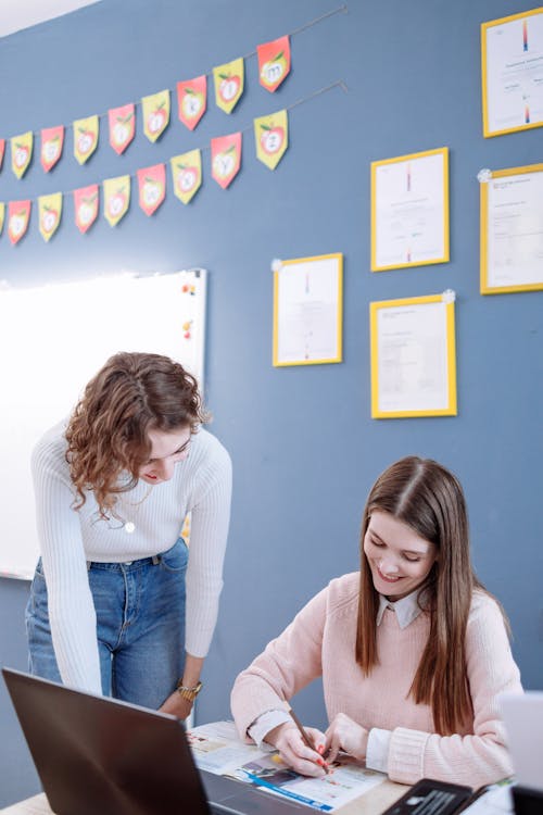 A Teacher Tutoring Her Student