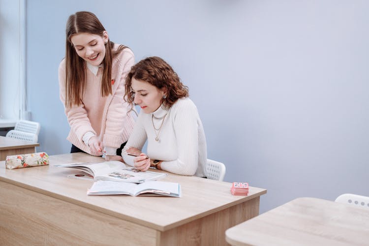 Teacher Teaching A Student