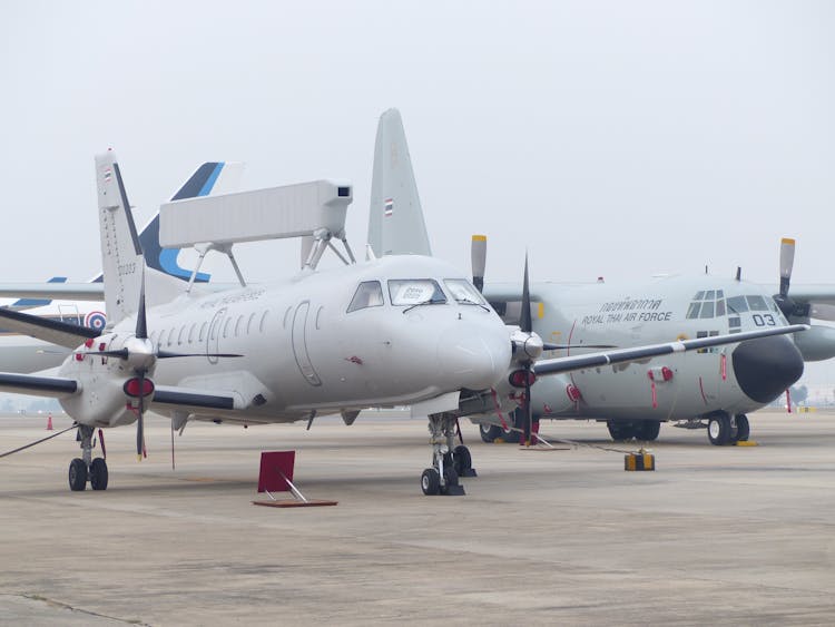 Airplanes On Airport Runway