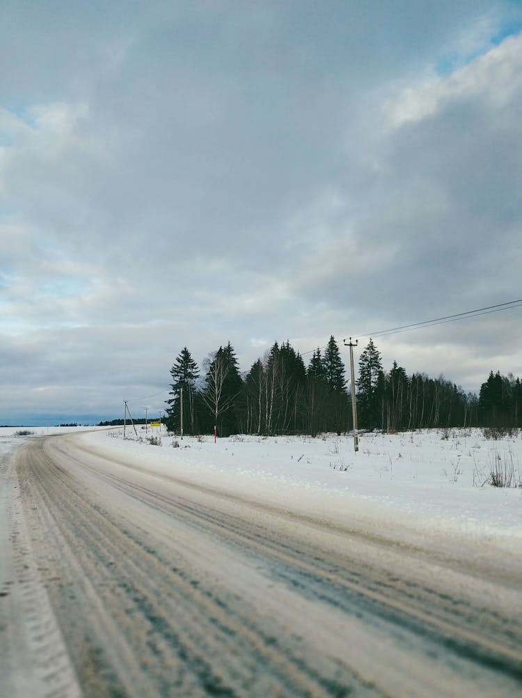 Snow Covered Road In A Winter 