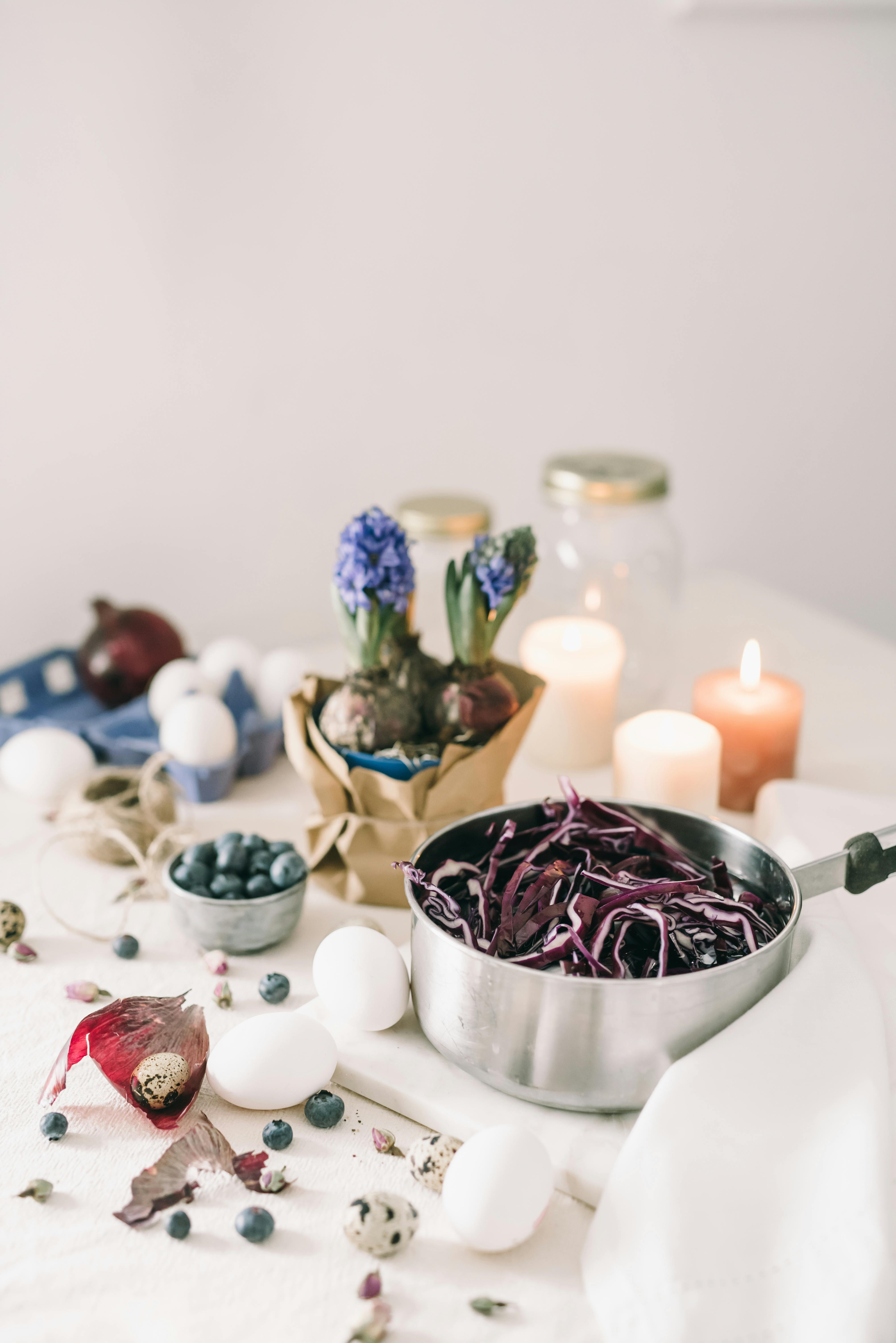 Photo Of Creative Process Of Blue Eggs · Free Stock Photo