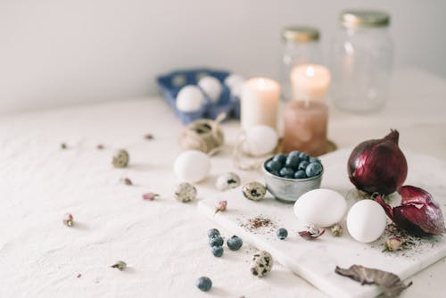 Red Onion And Eggs And Blueberries On Table