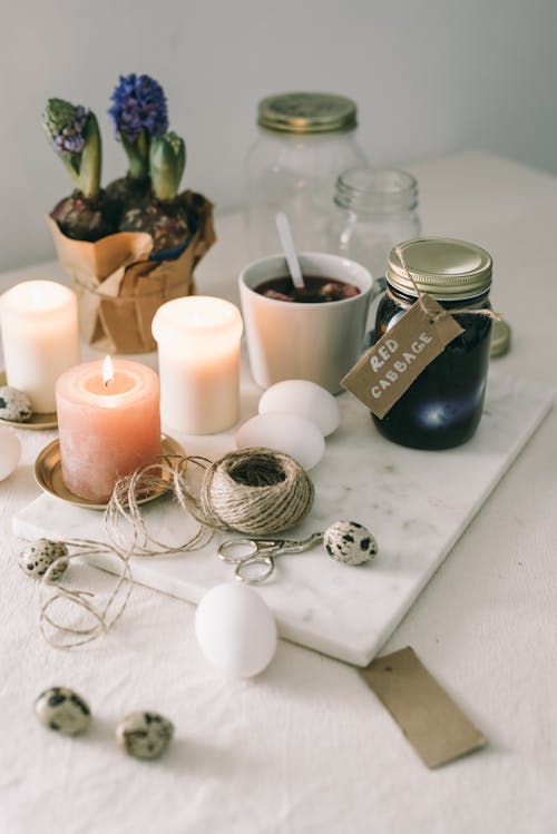 Free Lighted Candles On Table Beside Herbal Tea Stock Photo