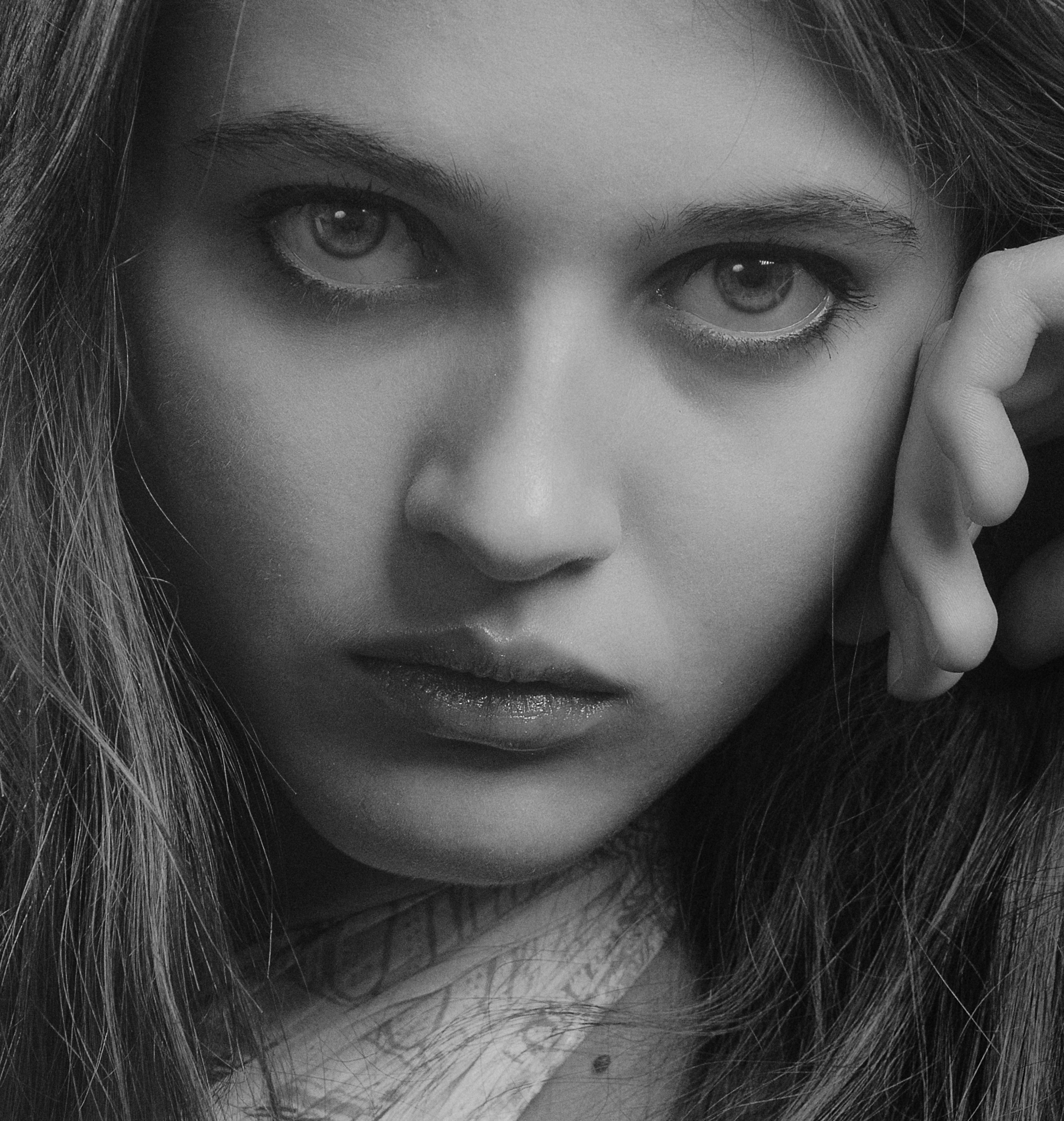 Monochrome portrait of a woman in Kyiv, capturing intense expression.