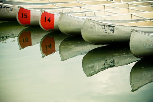 Free Reflecetion of Canoes on the Lake Stock Photo