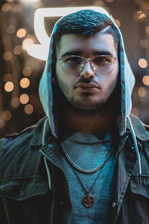 Free A Man Wearing a Hoodie and a Pair of Eyeglasses Stock Photo
