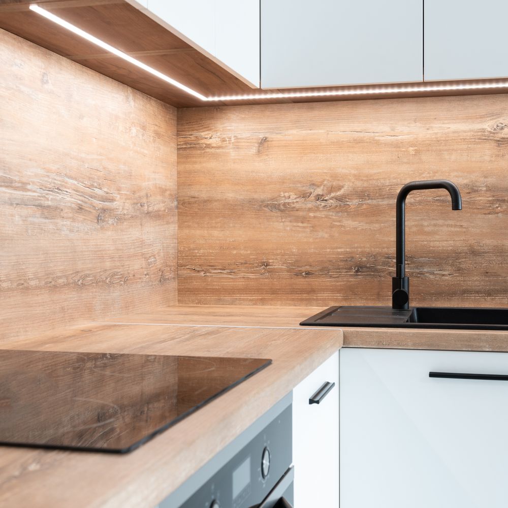 Kitchen Spraying in Welling — dust sheets down and the room fully protected