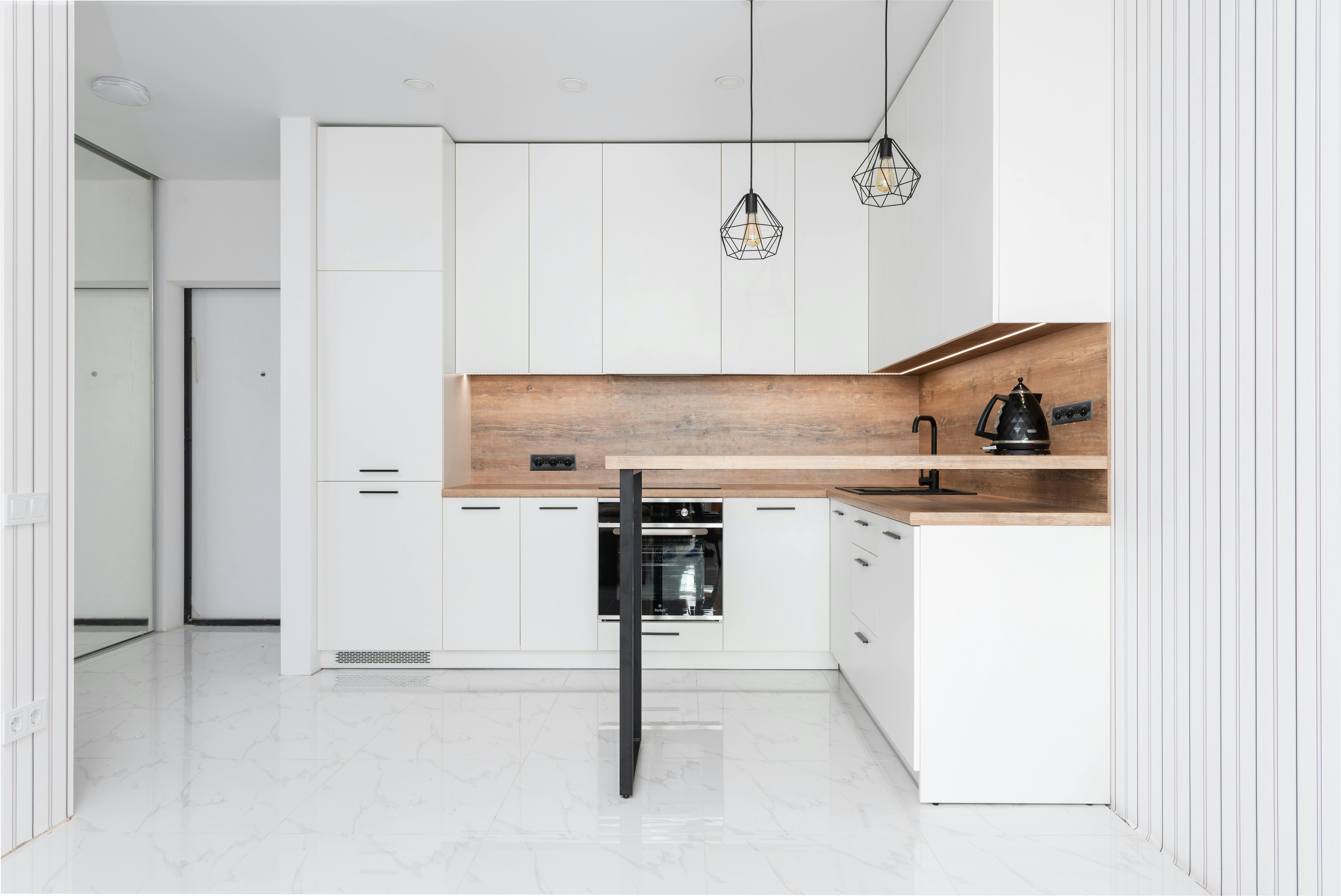 interior of contemporary kitchen with white cabinets