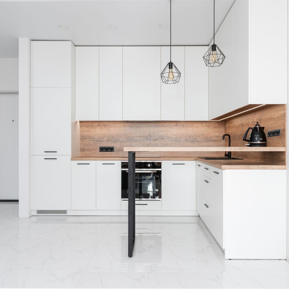 Kitchen Spraying in Hackney Central — surfaces prepped and cut in by hand