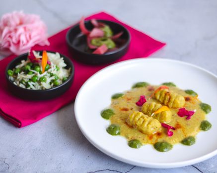 A beautifully plated gourmet dish with vibrant garnish, showcasing a true art of food presentation.
