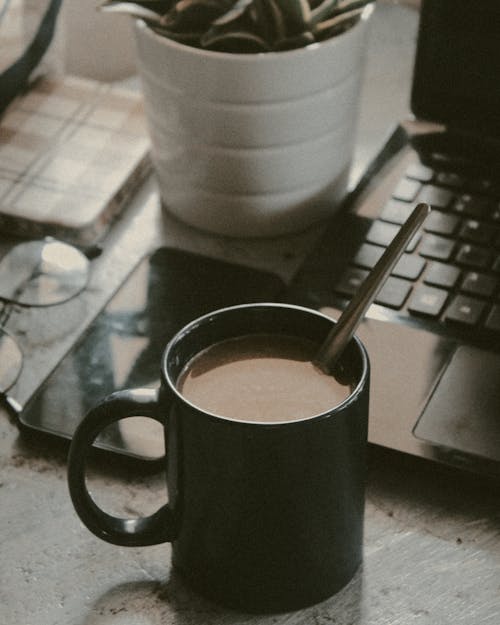 Close-up Photo of Coffee on a Mug 
